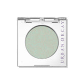 Urban Decay Lucid Teal Shimmer Transformer swatch shows vivid pigment for bold lids.