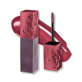 Urban Decay Vice Lip Bond gloss on lips in Backtalk for long-lasting shine.