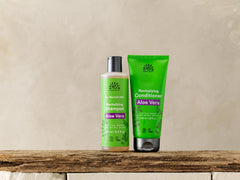 Close-up of Urtekram Aloe Vera Conditioner ingredients including aloe, lecithin, glycerine.