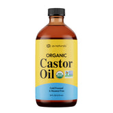 Us Naturals Castor Oil in glass bottle for pure hydration and glow.