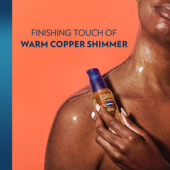 Vaseline Illuminate Me oil on leg reveals warm copper shimmer