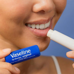 Original balm on lips provides clear moisture for everyday use.