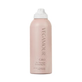 VEGAMOUR GRO Dry Shampoo bottle demonstrates oil absorption for refreshed roots and volume.