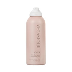 VEGAMOUR GRO Dry Shampoo bottle demonstrates oil absorption for refreshed roots and volume.