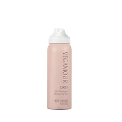 VEGAMOUR GRO Dry Shampoo travel-size bottle for on-the-go refresh and oil absorption.