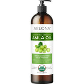 Velona Amla Oil bottle shows pure organic formula for deep hydration.