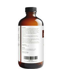 Velona Jojoba Oil bottle pour for simple skincare and hair care routine.
