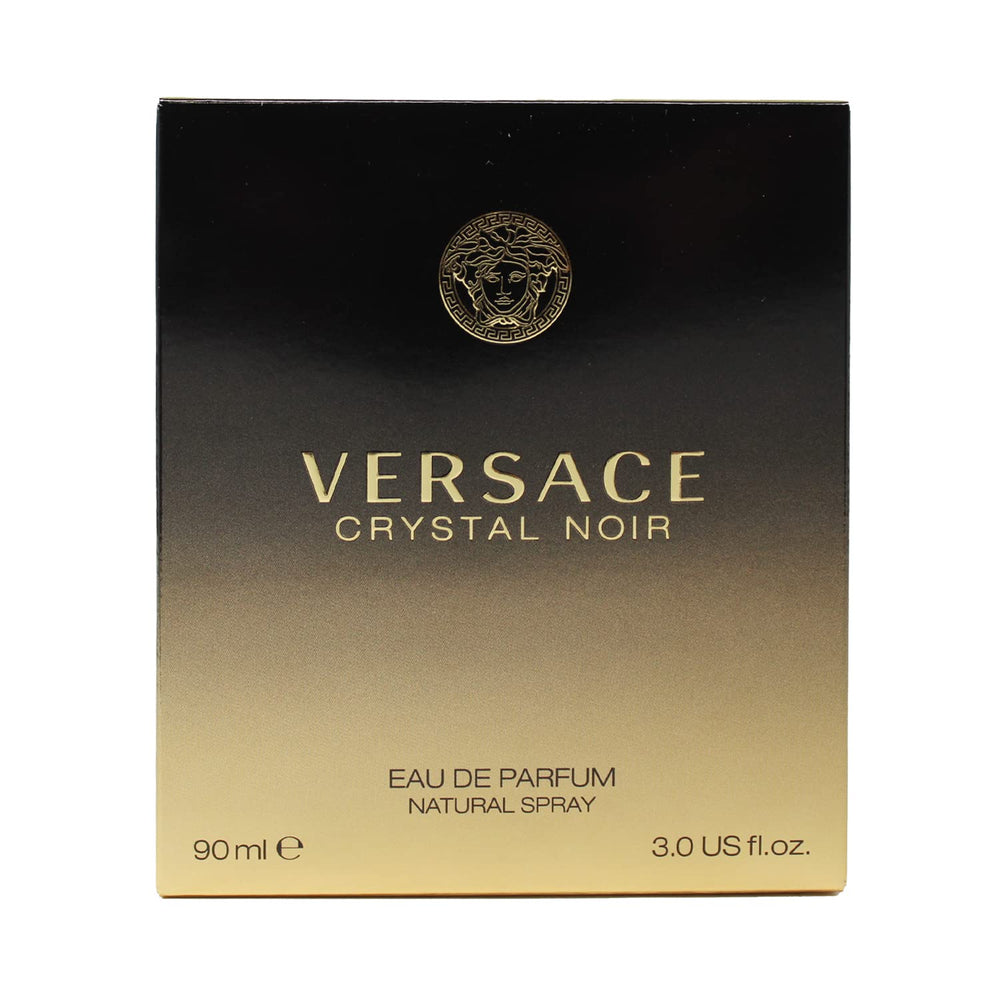 Versace Crystal Noir bottle close-up highlighting amber floral elegance for evening wear