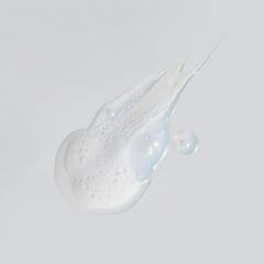Versed Purist foaming cleanser demonstrates a soft, plush lather for clean skin.
