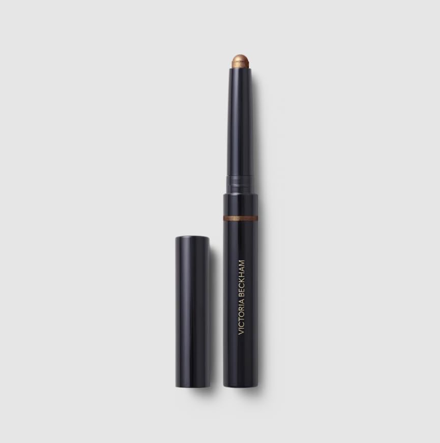 Victoria Beckham EyeWear Longwear Eyeshadow Stick Caramel cap swatch demonstrates smooth, fade-proof color.