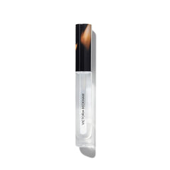 Victoria Beckham Beauty High Gloss Lip Gloss wand glides smoothly for shine.