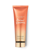 Victoria's Secret Amber Romance lotion bottle highlights a nourishing, long-lasting scent for daily use