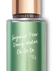 Closeup of Victoria's Secret Pear Glace spray highlighting pear notes and freshness.