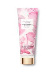 Victoria's Secret Pomegranate & Lotus bottle pour showcases silky hydration for soft skin.