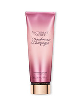 Victoria's Secret Strawberries & Champagne lotion bottle delivers light hydration with a fruity-floral scent.