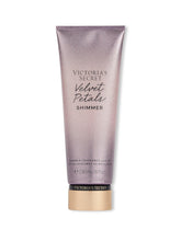 Victoria's Secret Velvet Petals Shimmer Lotion bottle showing glossy moisturizing formula