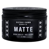Victory Crown Matte Pomade tub open showing a natural matte finish for everyday style.