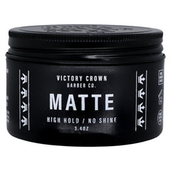 Victory Crown Matte Pomade tub open showing a natural matte finish for everyday style.