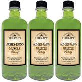 Village Naturals Therapy bottle front highlighting muscle relief bath oil for tub use.