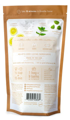 Village Naturals Therapy Breathe foaming bath water showing rich bubbles for warmth