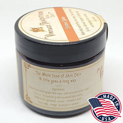 Vintage Tradition balm jar closeup texture highlighting rich, fast-absorbing hydration.