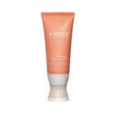 VIRTUE Curl Conditioner bottle with jojoba oil delivering hydrated curls.
