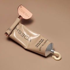 VOESH Neroli Patchouli Hand Balm close-up shows quick-absorbing texture for daily use.