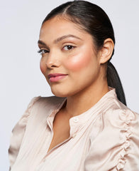 Wander Beauty cream blush stick delivering buildable color to cheeks
