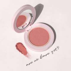 Wander Beauty Hydrating Powder Blush compact close-up demonstrating blendable color
