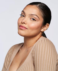 Close-up of Wander Beauty dual-ended stick with creamy texture.