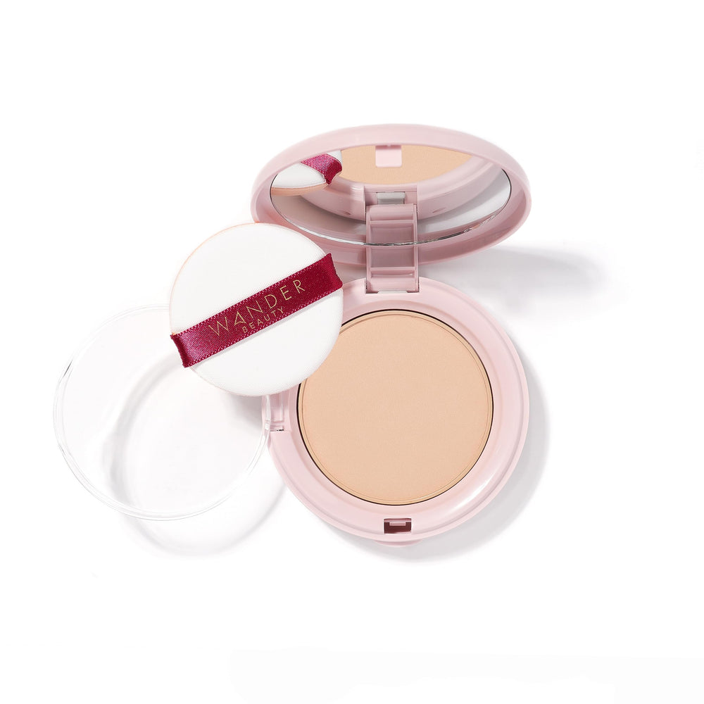 Wander Beauty Wanderlust Powder Foundation fair-light compact for lightweight coverage.