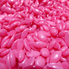 Waxness Pink Glow wax granules pre-melted for quick brow and facial wax sessions