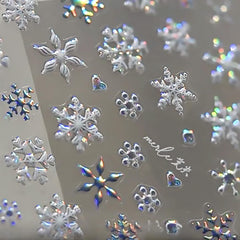WBRRFJJ 5D embossed Christmas snowflake stickers close-up for festive nails.
