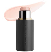 Westman Atelier Lit Up Nectar highlighter on cheekbones for a dewy glow