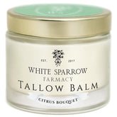 White Sparrow Farmacy Citrus Balm bottle offers instant skin hydration.
