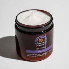 WHOLSEOME HIPPY Calm Body Cream jar closeup highlighting rich shea moisture.