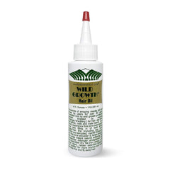 Wild Growth Hair Oil bottle pour demonstrates rich hydration for softer hair.