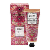 William Morris Strawberry Thief hand cream tube shows patchouli and red berry scent.