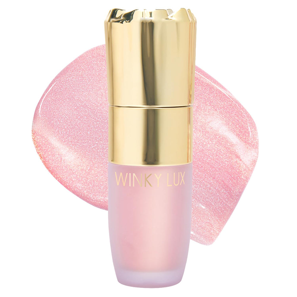 Winky Lux Cheeky Rose liquid highlighter application for a soft candlelit glow on the cheeks.