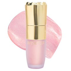 Winky Lux Cheeky Rose liquid highlighter application for a soft candlelit glow on the cheeks.