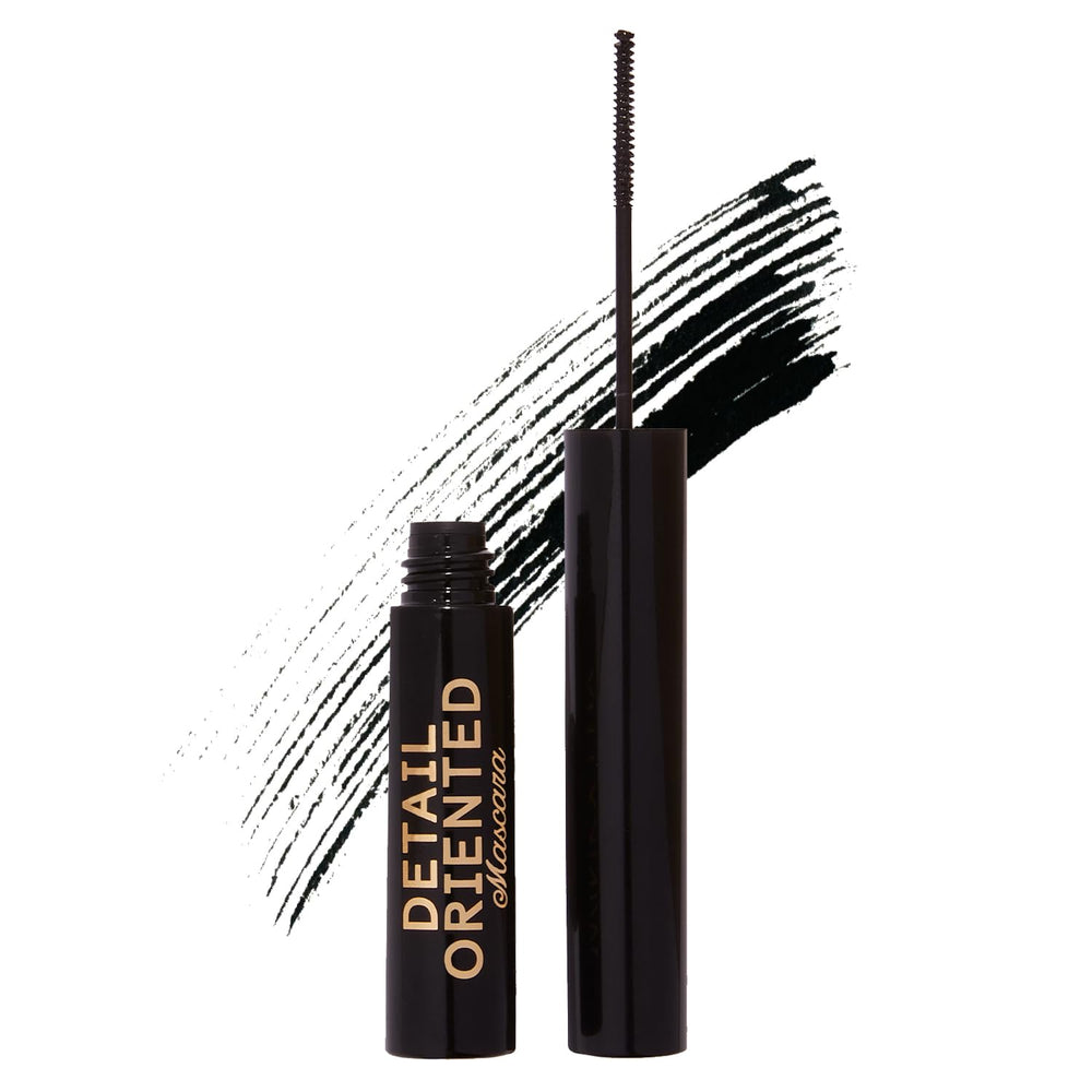 Winky Lux Detail Oriented Mascara with slim spoolie for precise lashes.