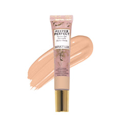 Winky Lux Peeper Perfect concealer neutral beige bottle close-up for long-lasting under-eye coverage.