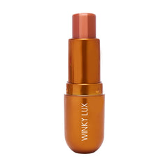 Winky Lux Pumpkin Spice Latte balm close-up tube showing hydrating formula for lips.