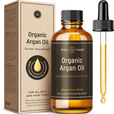 WoldoHealth Argan Oil bottle with pipette for precise daily nourishment of hair and skin.