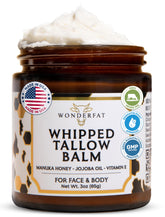 Wonderfat grass-fed whipped tallow balm on face for deep hydration.