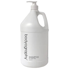 World Amenities Bodyography Blanc Shampoo bottle demonstrates luxurious self-care benefits for all hair types.