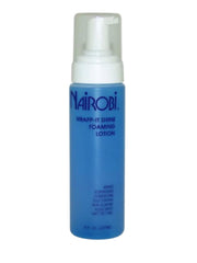 Wrapp-It Shine Foaming Lotion bottle demonstrates heat protection up to 450°F.