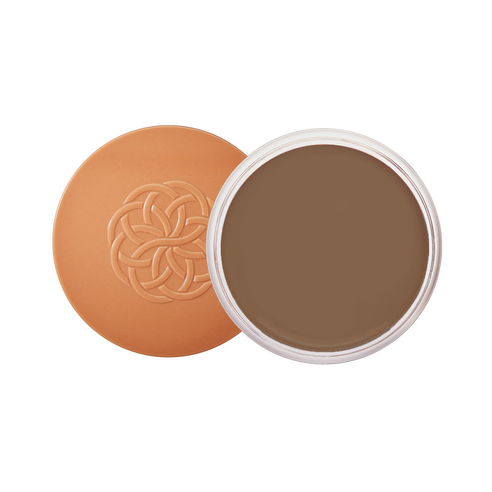 YENSA Silk Bronzing Base Cream Bronzer bottle close-up in Sundown Glow for effortless sun-kissed warmth.