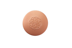 YENSA serum-infused powder texture highlights skin-like coverage and natural glow.
