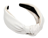 YETASI white leather knotted headband top knot on model for a polished look.